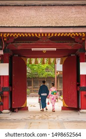 Back View Of A Couple. Japanese Couple Dressed Up In Traditional Kimono In Dazaifu Tenmangu, Fukuoka, Kyushu, Japan.