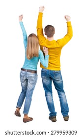 Back View Of Dancing Young Couple. Dance Party. Backside View Of Person.  Rear View People Collection. Isolated Over White Background. A Pair Of Fans Raised Their Hands Up With Joy.