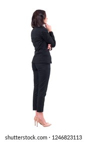 Back View Of Elegant Business Woman In Suit Looking Away At Something Watching Interested. Full Body Isolated On White Background. 
