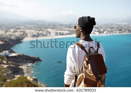 Similar – Unrecognizable traveler standing on volcano in Tenerife