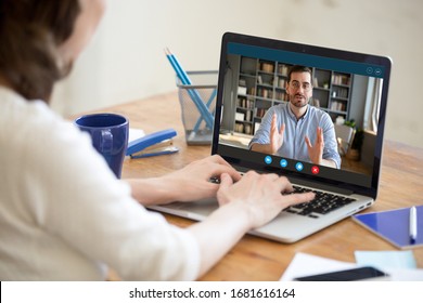 Back view of female employer talk interview confident male job applicant via online video call on laptop, businesswoman speak hire work candidate or consult client, use webcam conference on computer - Shutterstock ID 1681616164