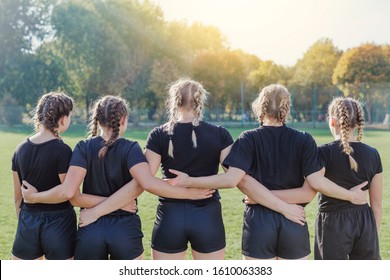 Back view of female rugby team - Powered by Shutterstock