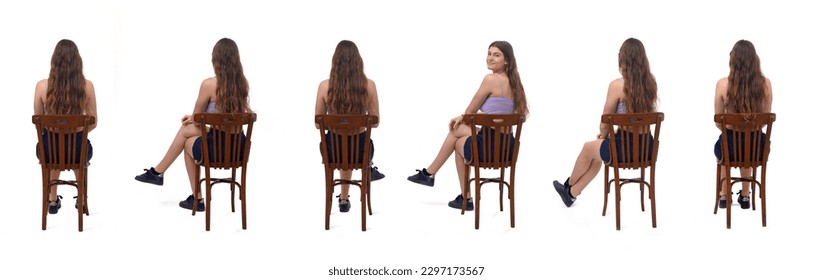 back view of a group of same young girl sitting  on chair and turned and looking at camera on white background