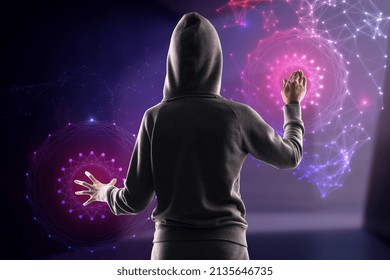 Back view of hacker using abstract polygonal circles interface on blurry purple background. Metaverse and future concept