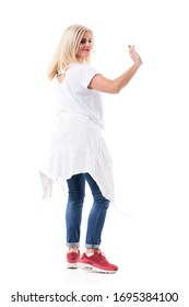 Back View Of Happy Mid Age Woman Walking Away Turning Behind And Waving Hand Goodbye. Full Body Length Isolated On White Background.