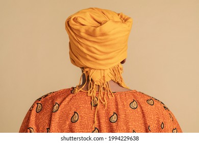 Back View Of An Indian Man Wearing A Yellow Turban