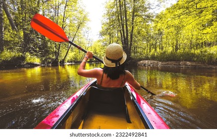 Back view Kayaking couple in river. POV of woman kayaking in beautiful landscape. Aquatic sports during fall autumn concept.Beautiful calm relaxing warm scenic trees autumn - Powered by Shutterstock