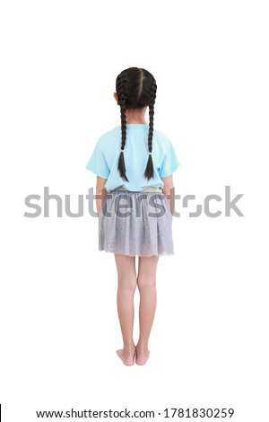 Back view little asian child girl with pigtail hair isolated over white background.