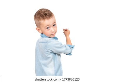 Back View of Little Boy Drawing with Pencil isolated on white background