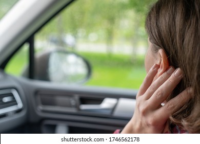 Back View Of Lonely Girl Looking Through Rainy Window With Drop Of Car. 