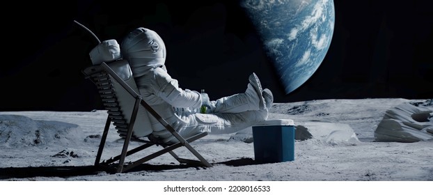 Back view of lunar astronaut having a beer while resting in a beach chair on Moon surface, saluting to Earth - Shutterstock ID 2208016533
