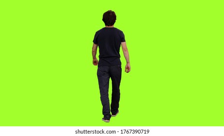 Back View Of A Male In Black T-shirt Walks On Green Screen Background, Chroma Key