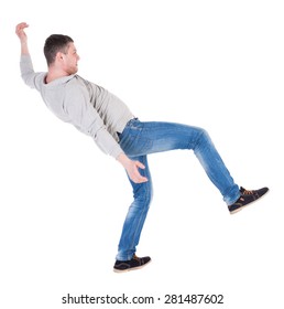 Back view man Balances waving his arms. Rear view people collection. backside view of person.  Isolated over white background. the falling man balancing on one leg.