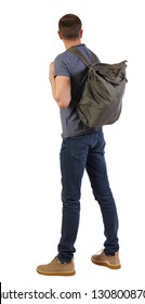 Back View Of A Man With A Green Bag.  Backside View Of Person.  Rear View People Collection. Isolated Over White Background. Tourist With A Backpack Behind His Back Tiredly Looking Forward.