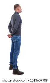 standing sideways images stock photos vectors shutterstock https www shutterstock com image photo back view man jeans standing young 1013607709
