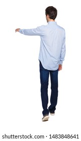 Back View Of A Man Walking With A Pointing Hand. Going Guy Showing. Backside View Of Person. Rear View People Collection. Isolated Over White Background.