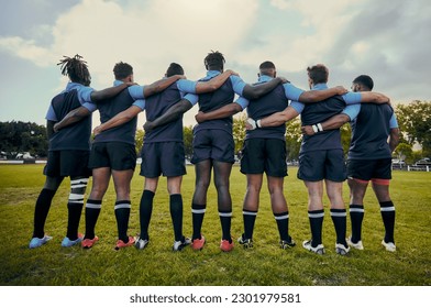 Back view, men or rugby team in stadium with support, unity or pride ready for a sports game together. Fitness, solidarity or proud players in line for match, workout or exercise on training field - Powered by Shutterstock