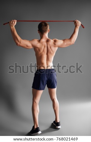 Similar – Young male bodybuilder posing