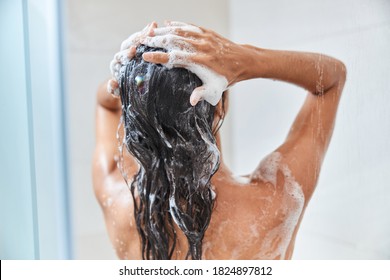 Back View Of Naked Lady With Long Wet Hair Taking Shower At Home