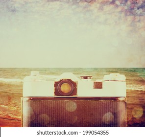 back view of old camera in front sea