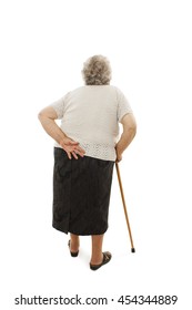 Back View Of A Old Woman With A Cane Looking Up. Rear View People Collection. Isolated On White Background 