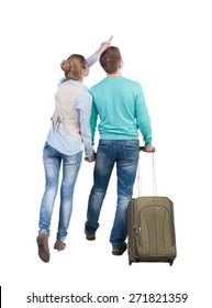 Back View Of Pointing Couple With  Green Suitcase Looking Up. Rear View People Collection.  Backside View Of Person.  Isolated Over White Background. 