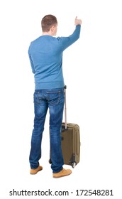 Back View Pointing Man With Suitcase. Guy Pointing. Backside View Person.  Rear View People Collection. Isolated Over White Background. Guy With Travel Bag On Wheels Looking At Something At Top