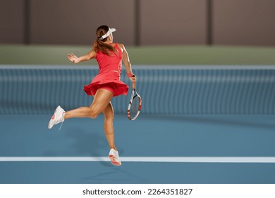 Back view of professional female tennis player serving - Powered by Shutterstock