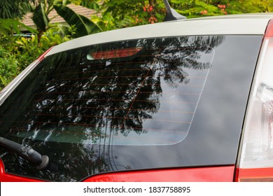 Back View Of Red Car Window For Sticker Mockup