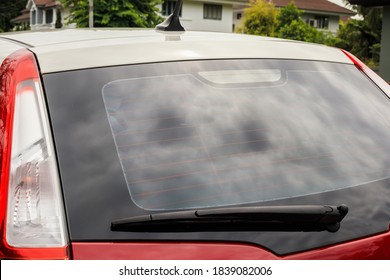 Back View Of Red Car Window For Sticker Mockup