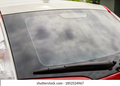Back View Of Red Car Window For Sticker Mockup