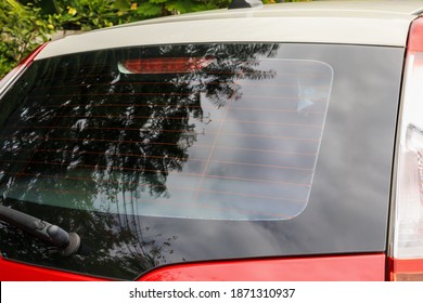 Back View Of Red Car Window For Sticker Mockup