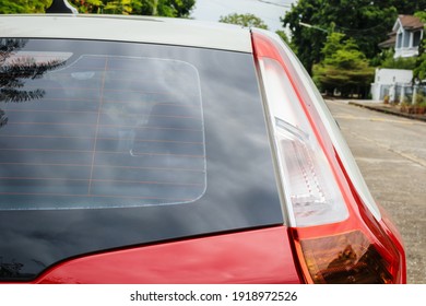 Back View Of Red Car Window For Sticker Mockup