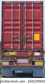 Back View Of Red Cargo Container On The Truck