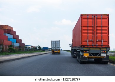 Back view of Red Container truck in ship port Logistics.Transportation industry in port business concept.import,export logistic industrial Transporting Land transport on Port transportation storge 