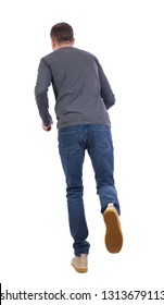 Back View Of Running  Man. Backside View Of Person.  Rear View People Collection. Isolated Over White Background. A Man In A Gray Jacket Runs Off Into The Distance.