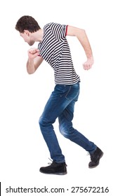 Back View Of Running Man In Brown Shirt. Walking Guy In Motion. Rear View People Collection. Backside View Of Person. Isolated Over White Background. The Guy In The Sailor Suit Dancing.