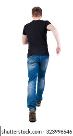 Back View Of Running Man In Brown Shirt. Walking Guy In Motion. Rear View People Collection. Backside View Of Person. Isolated Over White Background. Man Escapes Strides.