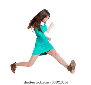 Back View Of Running  Woman. Beautiful Girl In Motion. Backside View Of Person.  Rear View People Collection. Isolated Over White Background. Purposeful Girl In Broad Jump