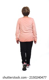 Back View Of Senior Woman Walking On White Background