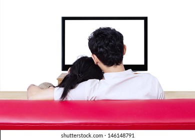 Back View Shot Of Romantic Young Couple Watching Tv On White Background