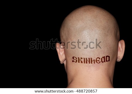 Back view of a skinhead boy.
