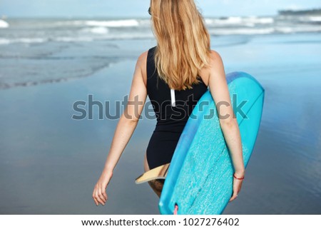 Similar – Image, Stock Photo Surfer woman Beach Ocean