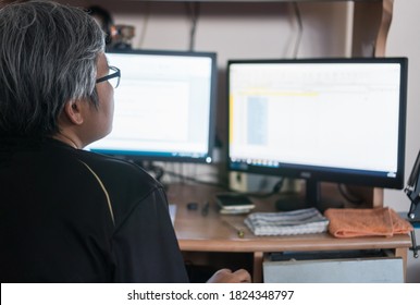 Back View Smart Older Asian Woman Programmer In Computer Technology Working On Developing Company Office On Coding Application In Pc For Learning Education In Home, Mockup Desktop