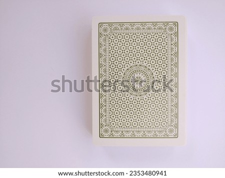 Back view of stack of poker cards or playing cards isolated on white background
