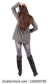 Back View Of Standing Young Beautiful  Woman.  Brunette Girl In Jeans And Coat Watching;. Rear View People Collection.  Backside View Of Person.  Isolated Over White Background.