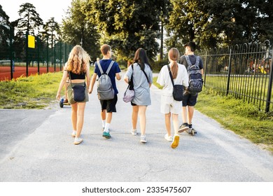 back view students going for a class in college. friends going for class in high school in Ukraine. - Powered by Shutterstock