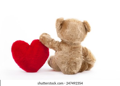 Back View Of A Teddy Bear With Red Heart Over White