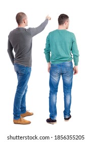 Back view of two man in sweater pointing. Rear view people collection. backside view of person. Isolated over white background. - Shutterstock ID 1856355205