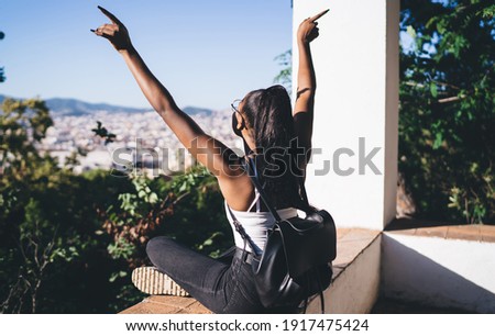 Similar – Image, Stock Photo Anonymous woman with backpack in boarding bridge